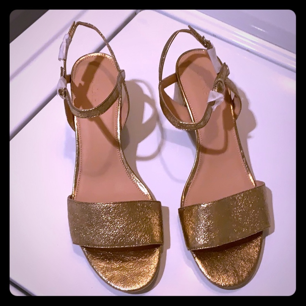 Gold leather Kate Spade sandals.